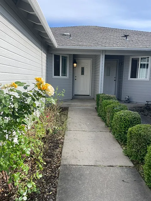 Entry; 
Note: There is a single wall shared with a neighbor. - 1040 Brandi Way