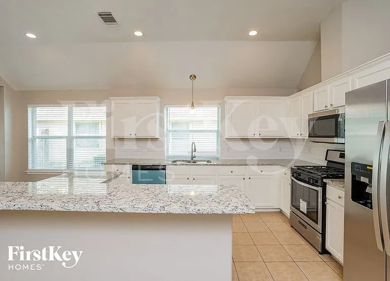 3310 Rainport Dr — Photo 6