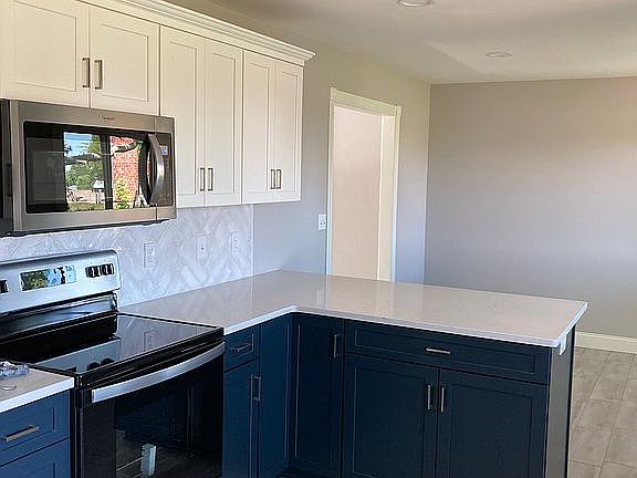 New cabinets with quartz top