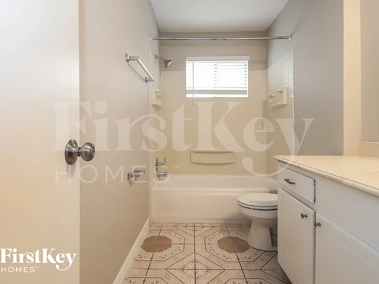 5614 Rivergate Dr — Photo 14