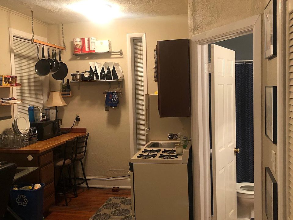 Kitchen and entrance to bathroom