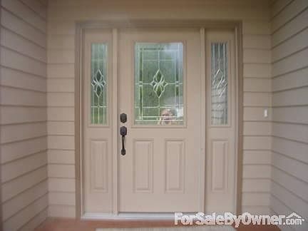 Covered Entry with Beautiful glass work : Ready for your own custom colors, entrance foyer with clos