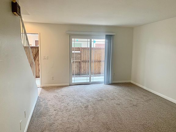 Living room with view to front patio