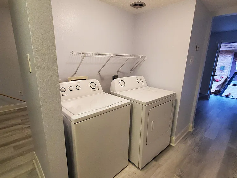 WASHER AND DRYER DOWNSTAIRS
NEW FLOORING AND PAINT