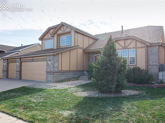 Home Showcases a Three Car Garage.