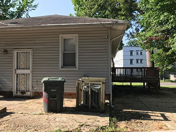 Rear of house and parking area.