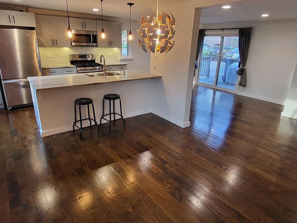 Dining area with Kitchen and Living Room in background
