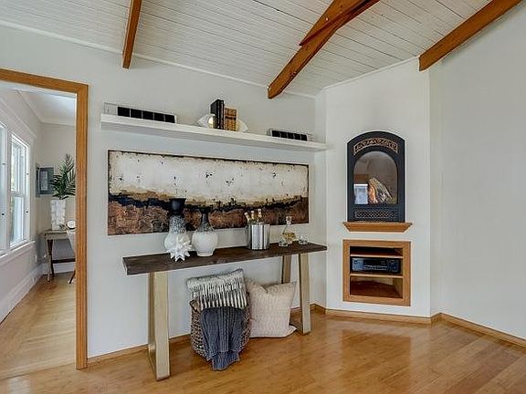 Cozy up by this gas fireplace on cooler days. Fireplace turns on easily and doesn't require cleaning or for wood to be replaced.