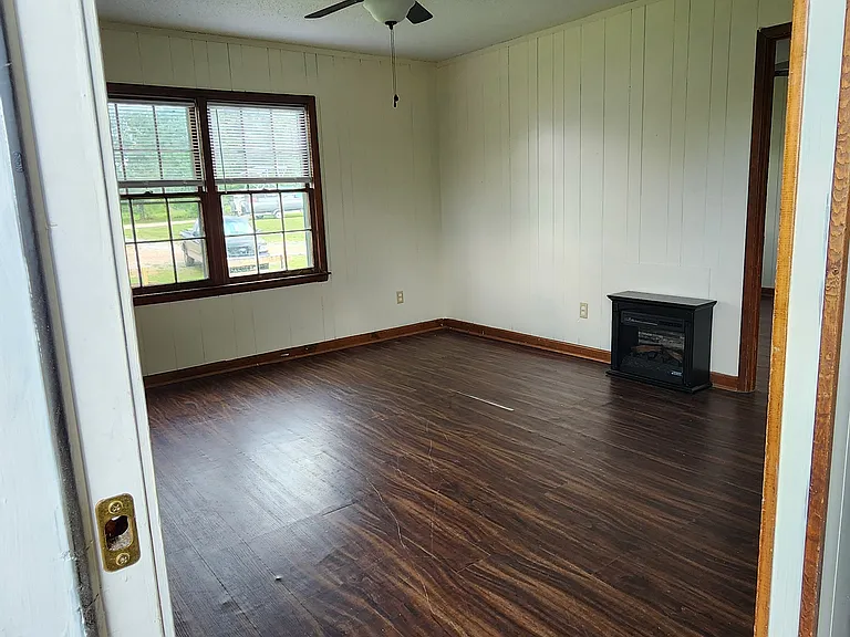Living room, adjacent to kitchen