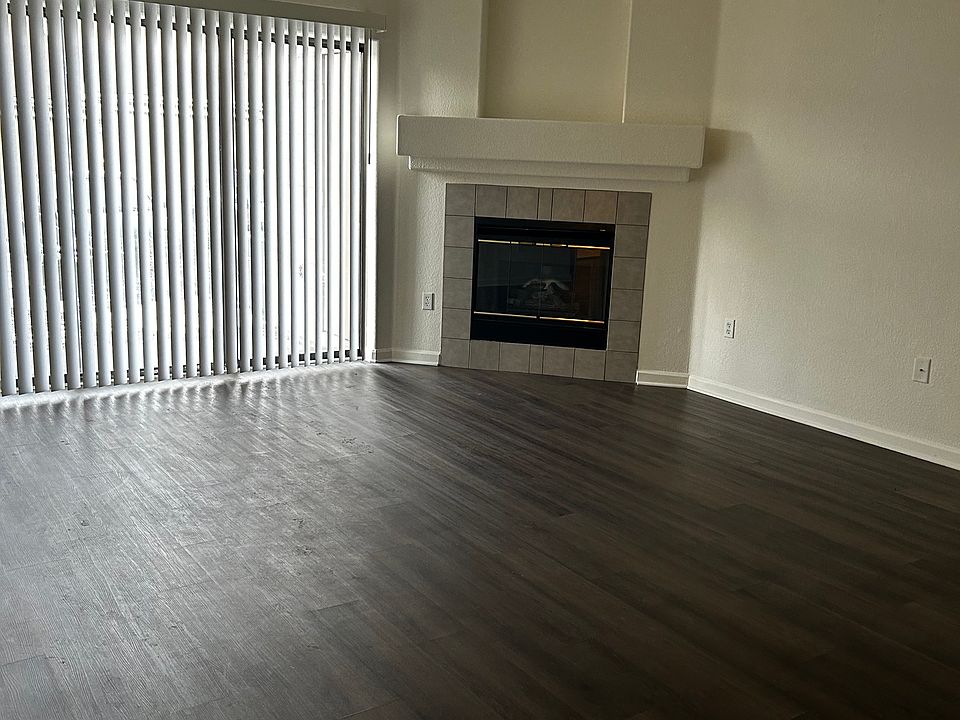 large living area with gas fireplace