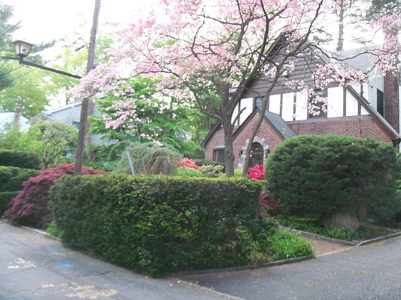 Front - long driveway and 2 car garage