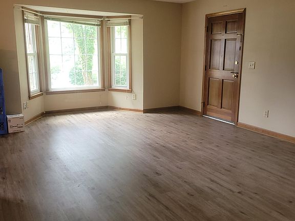 Living room with front door.