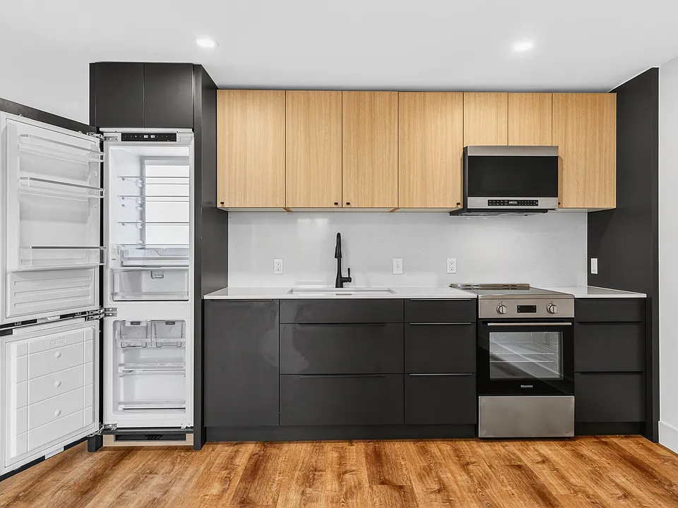 Kitchen for entertaining with top-notch appliances and cabinets.