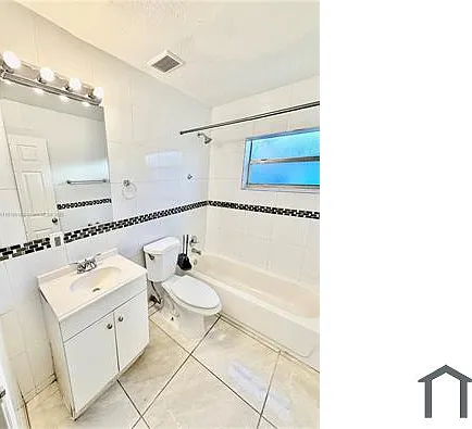 2571 NW 13th Ct — Photo 12