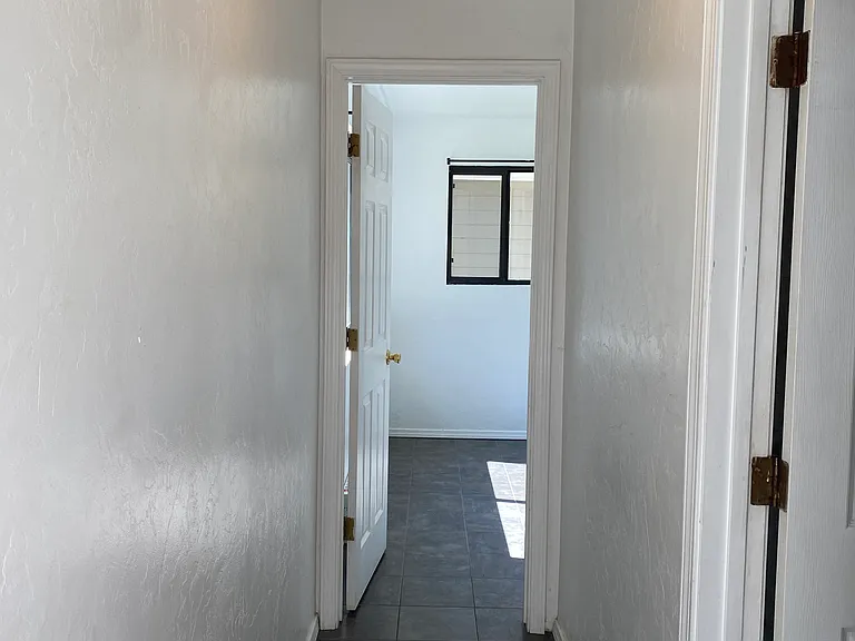 Hallway to bathrom #2 and bedroom #3