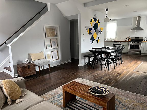 First floor open concept with energy efficient appliances and kitchen cabinetry, utensils, and cookware selected for cooks in mind.