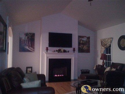 Living Room with Cathedral Ceilings & Gas Fireplace