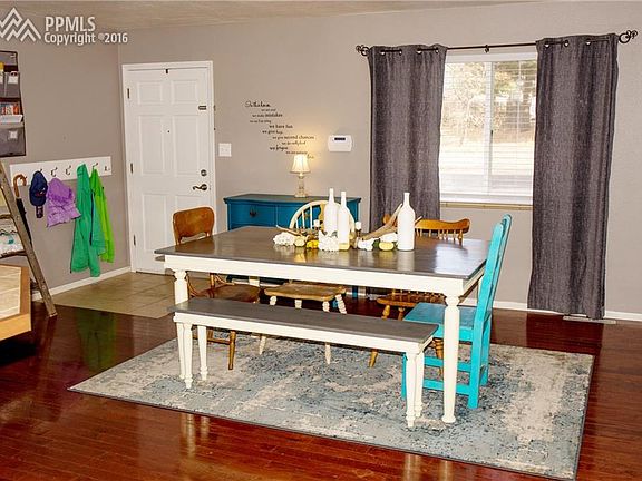 Gorgeous tiled entry and hardwood flooring