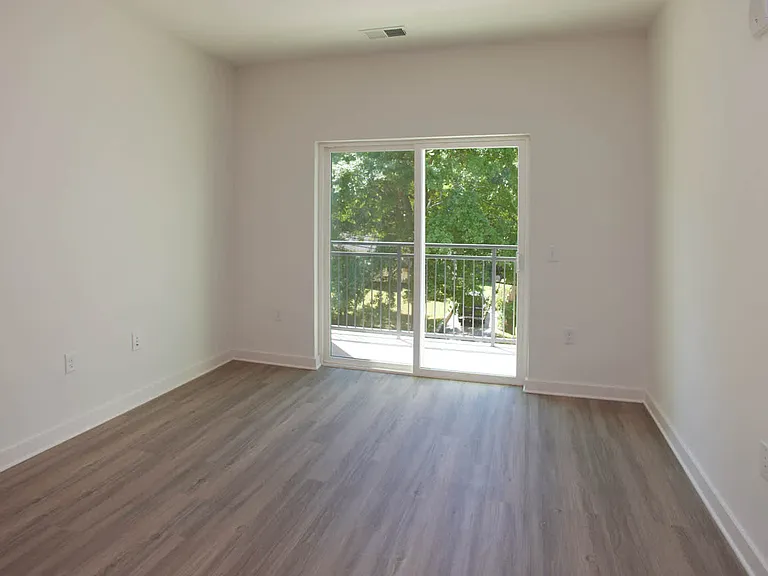 Living Room with Balcony and Hard Surface Flooring