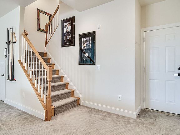 Stairs to Rec Rm/Door to Gar