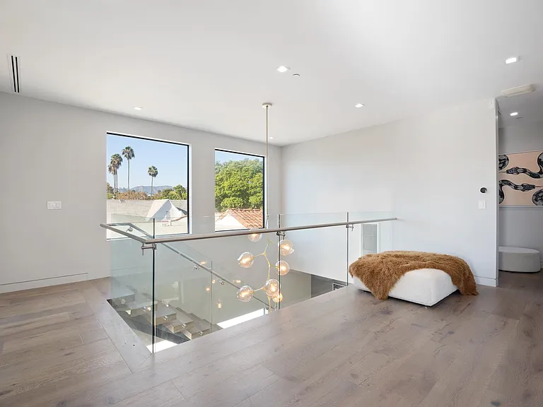 Wind down in the dual jetted spa tub
Towering ceilings add depth and scale