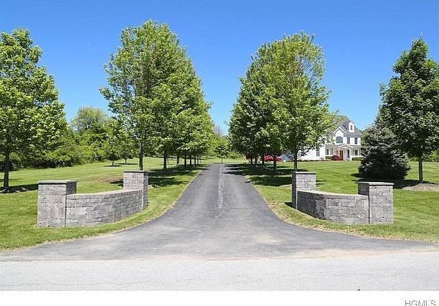 TREE LINED ENTRANCE TO YOUR NEW HOME!