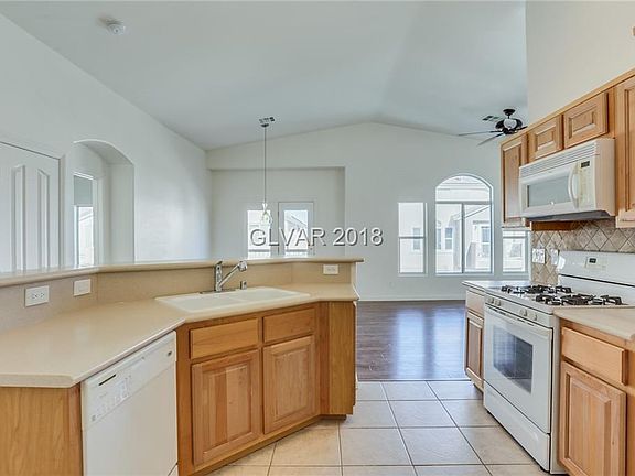 4th image of 8665 Traveling Breeze Ave Unit 101