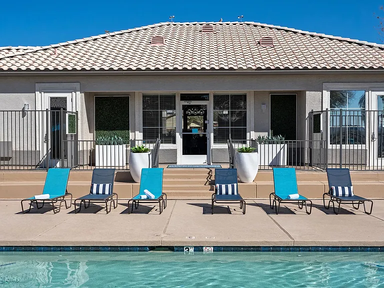 Lay back and soak up the Arizona sunshine on our vibrant poolside loungers, your personal ticket to paradise at home.
