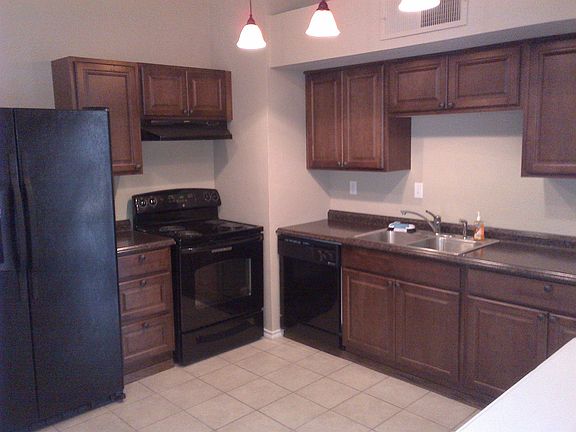 New Appliances, Cabinets, and Countertops in Kitchen