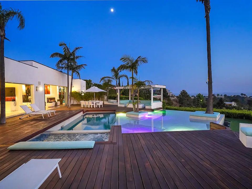 Experience Pool Serenity Under the Night Sky, where the peaceful ambiance invites relaxation and contemplation.
