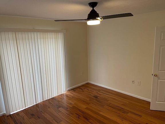 Newly installed hardwood floors in living room, bonus room, and hallway.