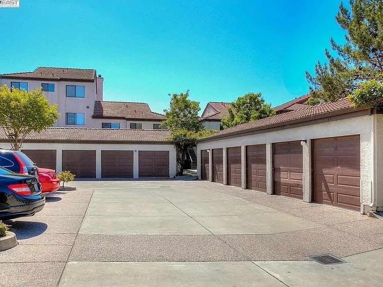 Garage (1 dedicated garage parking and 1 unreserved spot)