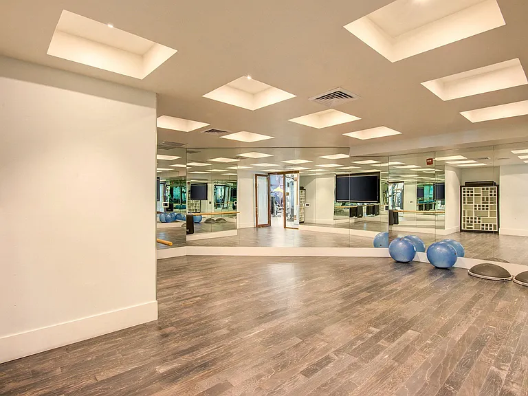 Separate yoga studio for a customizable workout.