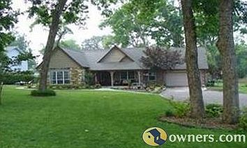 One acre lot w/mature trees.