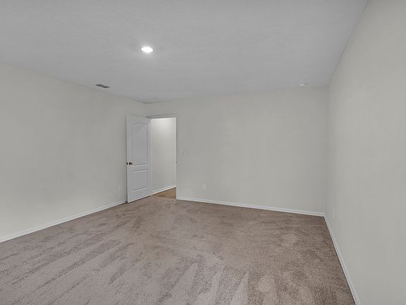 Unwind after a long day in this gorgeous master suite