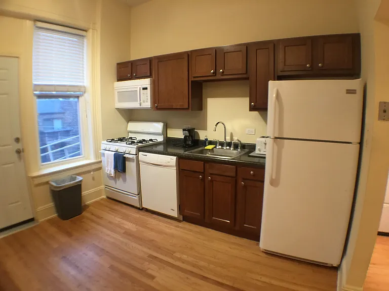 1153 W Dickens Ave — Photo 1