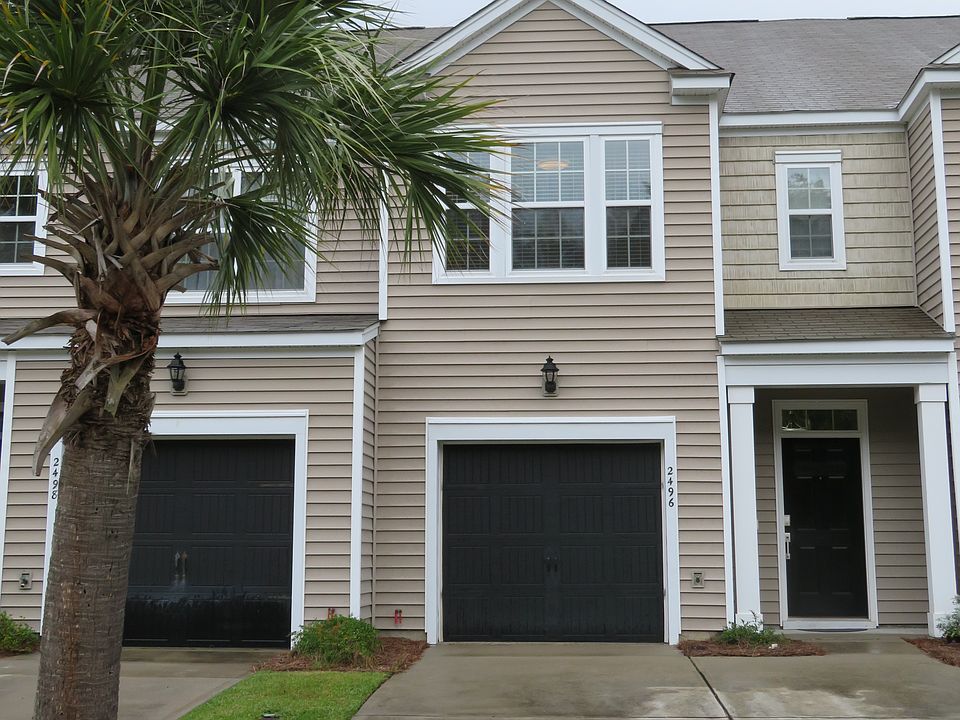 Street view of townhouse. Right inner unit in a four home building