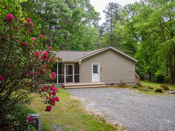 Side Exterior and Parking Area