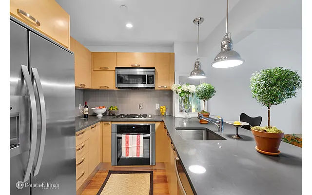 Sold by Douglas Elliman | media 11