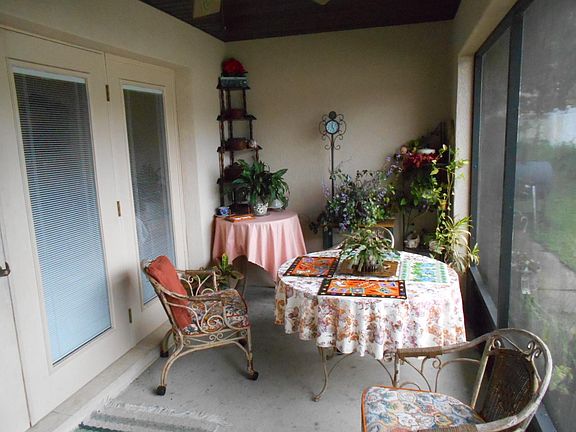 Screened in back porch. Lovely for coffee in the mornings.