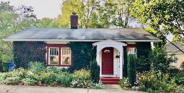 Small front yard with loads of perennials.