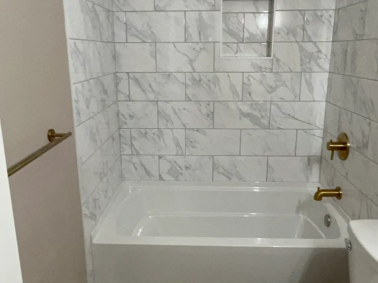 Fully Renovated Bathroom and Fixtures