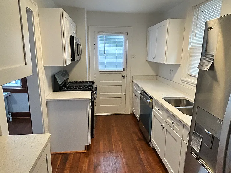 Kitchen with all new cabinets and new appliances - Referigerator, dish washer, Gas cooking range, Microwave oven, Double sink with Garbage disposer