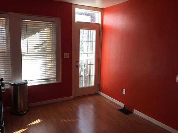 Large kitchen with lots of natural light, ceiling fan, moder