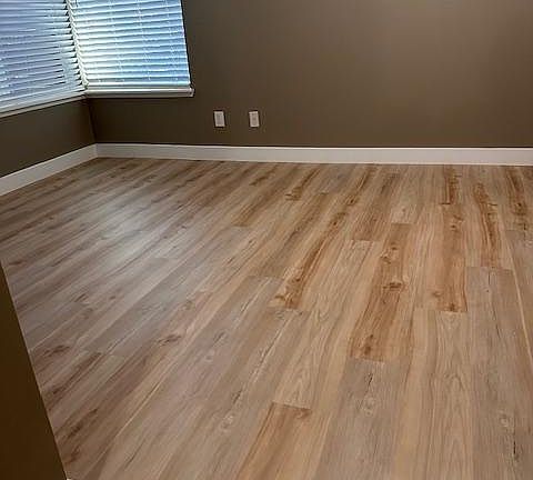 New hard wood flooring throughout unit.