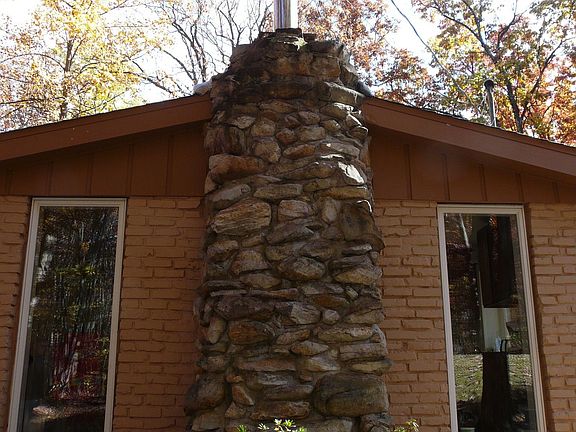 stone chimney w/stainless steel chimney insert