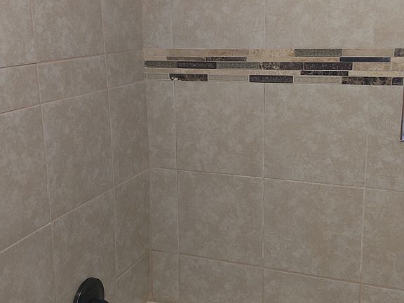 Jacuzzi Tub: Tile-to-Ceiling