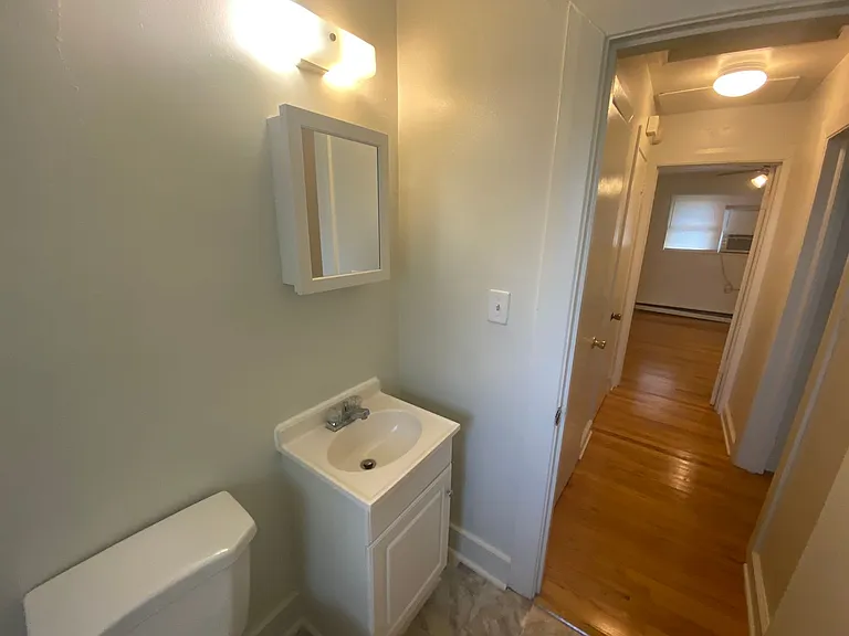 Private carport, in-unit laundry, and the Lakewood strip right outside your door. — Photo 10