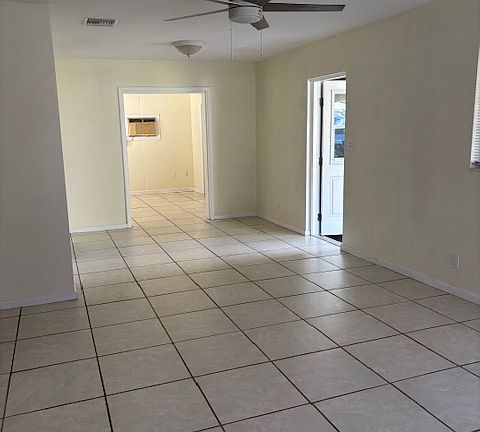 Side entry- living area- sunroom in the back