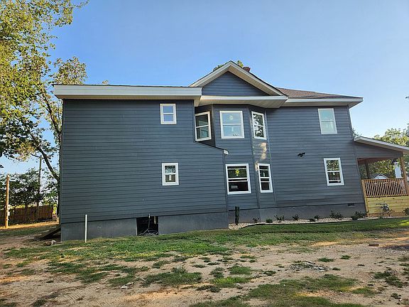 Right side of house.